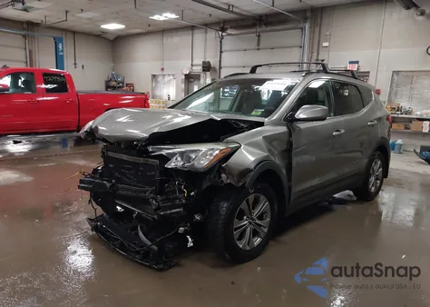 2015 Hyundai Santa Fe Sport 2.4L z USA, uszkodzony, nr VIN 5XYZU3LB0FG286493